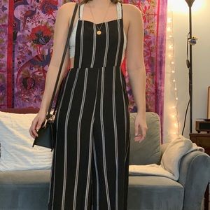 Black and white striped overall jumpsuit